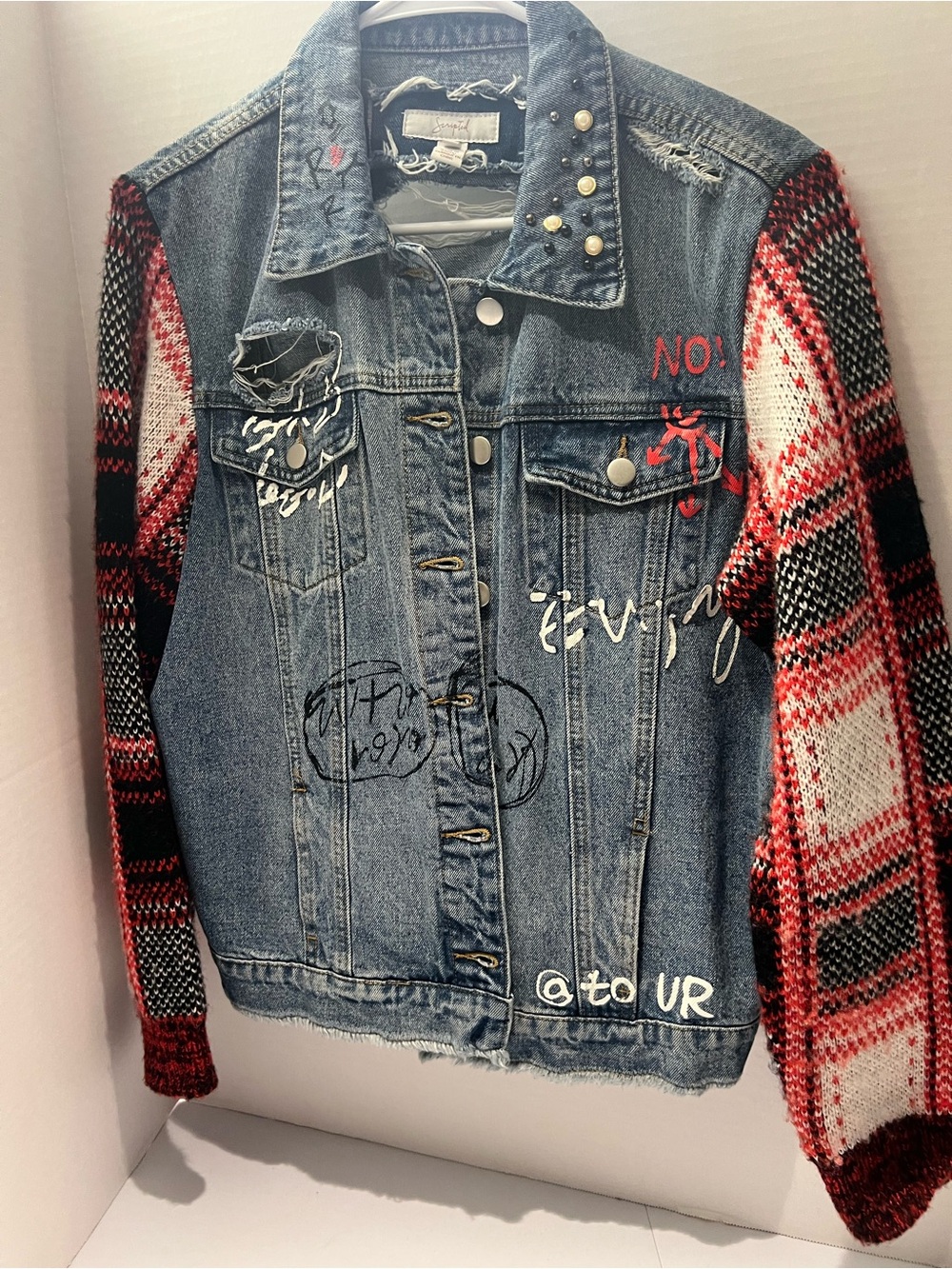 Women's Distressed Denim Jacket with Red Plaid Knit Sleeves